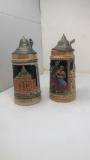 PAIR OF VTG GERMAN LIDDED CERAMIC STEINS