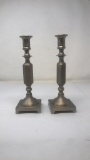 TWO SOLID BRASS CANDLESTICKS