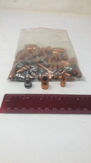 1 BAG OF MISC BRASS AND NICKLE BULLETS