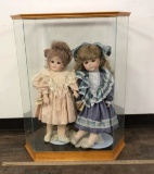 2) COLLECTIBLES BY EVIE DOLLS IN DISPLAY CASE
