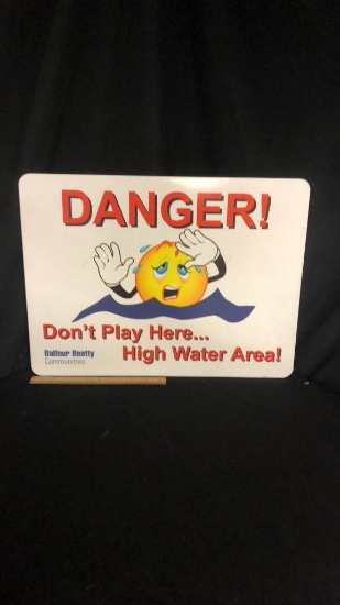 "DANGER! DON'T PLAY HERE... HIGH WATER AREA!" SIGN