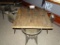 DISTRESSED RETAURANT TABLE & 4 METAL CHAIRS.