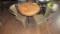 DISTRESSED ROUND RETAURANT TABLE & 2 METAL CHAIRS.