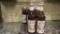 12) BOTTLES OF MONIN HONEY GOURMET SYRUP.