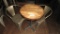 DISTRESSED ROUND RETAURANT TABLE & 2 METAL CHAIRS.