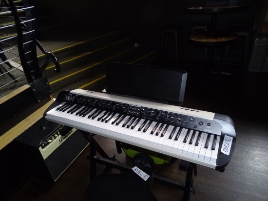 KORG ELECTRIC KEYBOARD & PYLE STAND.