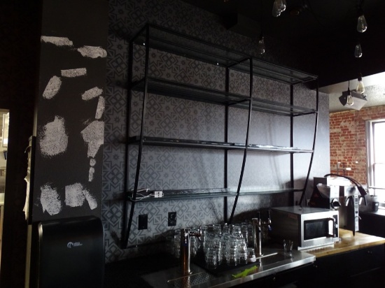 METAL AND GLASS LIT WALL SHELVING.