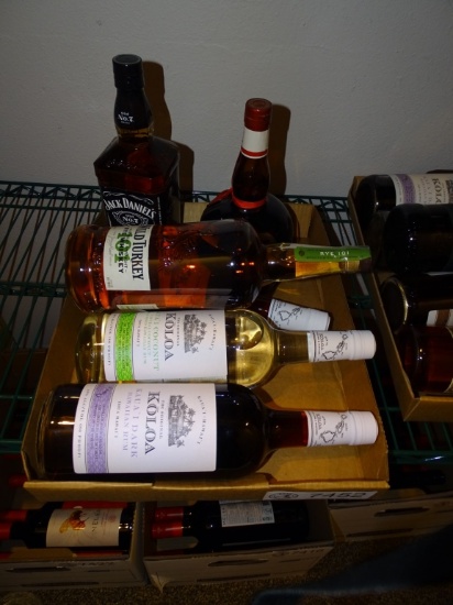 7) BOTTLES OF MISC UNOPENED LIQUOR