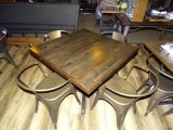 DISTRESSED RETAURANT TABLE & 4 METAL CHAIRS.