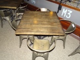 DISTRESSED RETAURANT TABLE & 4 METAL CHAIRS.