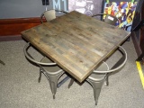 DISTRESSED RETAURANT TABLE & 4 METAL CHAIRS.