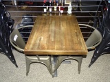 DISTRESSED RETAURANT TABLE & 2 METAL CHAIRS.