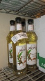 4) BOTTLES OF MONIN PURE CANE GOURMET SYRUP.