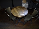 DISTRESSED ROUND RETAURANT TABLE & 2 METAL CHAIRS.