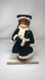VICTORIAN COLLECTIONS PORCELAIN DOLL IN GREEN