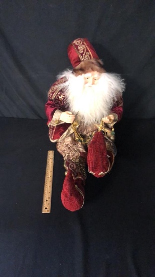 FANCY RED SUIT SANTA SITTING DOLL