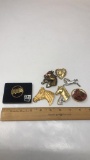 7) HORSE BROOCHES