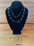 2) FETISH NECKLACE & EARRING SETS.