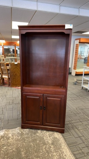 CHERRY COLORED WOOD BOOKCASE.