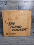 THE TURBO COOKER  4-IN-1 COOKER