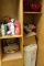 Contents of Cabinet Including Christmas Decorations, Cleaning Supplies and Misc Items