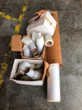 Rolls of Shrink Wrap and a Roll of Poly
