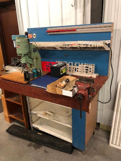 Workbench w/ Vise and Lawn Mower Battery