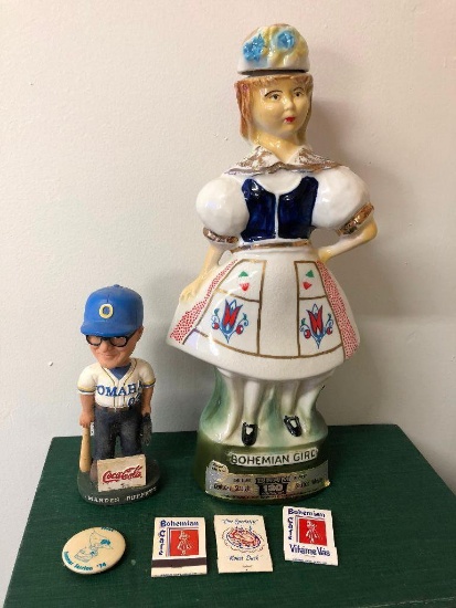 Omaha Lot: Bohemian Cafe Bohemia Girl Decanter, 3 Match Books & Warren Buffet Bobble Head