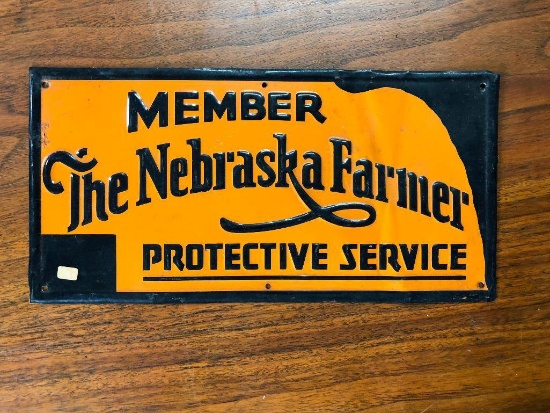 The Nebraska Farmer Protective Service Tin Sign, Embossed