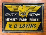 Unity Action Member Farm Bureau W.O. Loving Tin Sign