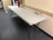Plastic Banquet Table (Located in Hallway by Kitchen Up/Down?)