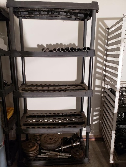 1 Commercial shelf with work-out weights and extra shelving tubes