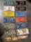 Several Vintage Kansas License Plates and Toppers