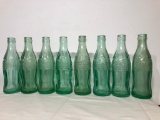 Lot of 8 Antique and Vintage Coca-Cola Bottles from Nebraska Bottling Companies