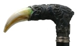 Curved Semi-Crook Handled Carved Silver and Bone Cane with Silver Collar