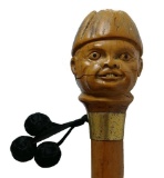 Carved Figural Cane with Gold Collar on Wooden Shaft