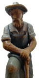 Carved Figural Mountain Man Stanind on L-Shaped Handle with Onrate Twisted Shaft