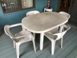 Plastic Patio Furniture, 8 Chairs, 2 Side Tables, and 1 Large Table