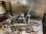 Silverware Caddies with Slotted Spoons and Whisks