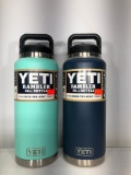 (2) Yeti Rambler 36oz Bottle Seafoam MSRP: $49.99, Yeti Rambler 36oz Bottle Navy MSRP: $49.99