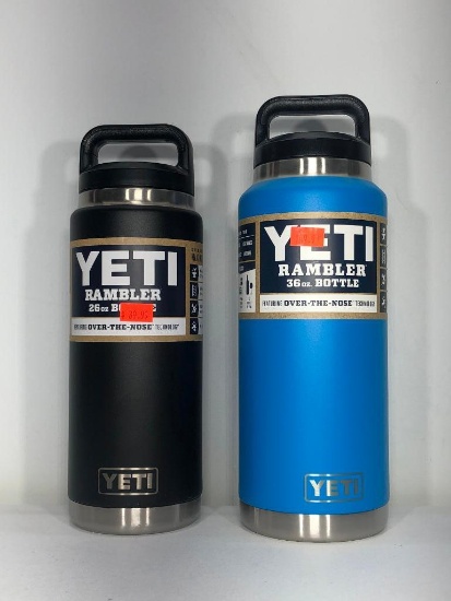 (2) Yeti Rambler 26oz Bottle Black MSRP: $39.99, Yeti Rambler 36oz Bottle Tahoe Blue MSRP: $49.99