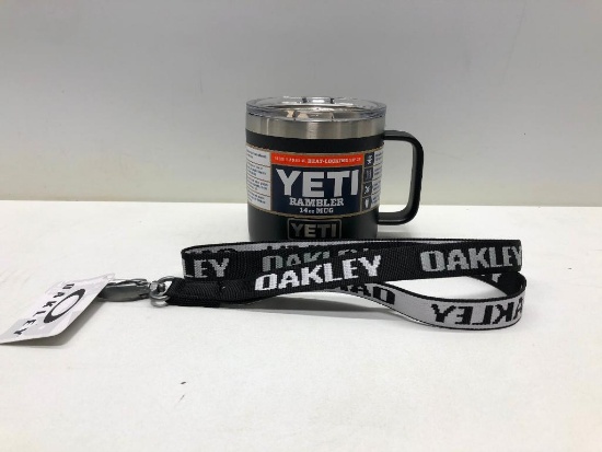 (2) Yeti Rambler 14oz Mug Black, Oakley Black and White Lanyard MSRP: $10.00