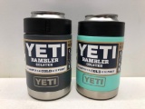 (2) Yeti Rambler Colster Charcoal MSRP: $24.99, Yeti Rambler Colster Seafoam MSRP: