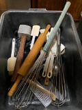 Tub full of Kitchen Utensils