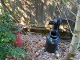 Iron Wheel, Pitcher Pump, Cream Can, and Concrete Bird Bath