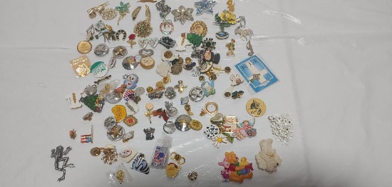 Assorted lot of pins, buttons, broaches