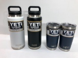 4 Items: 2x YETI 36oz Bottles - 1 Black, 1 White, 2x YETI 20oz Ramblers - Both Navy