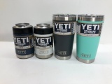 4 Items: 2x YETI 20oz Rambler - 1 Seafoam, 1 Charcoal, 2x YETI Colsters - 1 Navy, 1 White