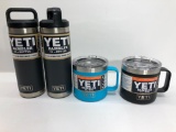 2 Items: 2x YETI 18oz Bottles - Both Charcoal, 2x YETI 14oz Mugs - 1 Black, 1 Reef Blue