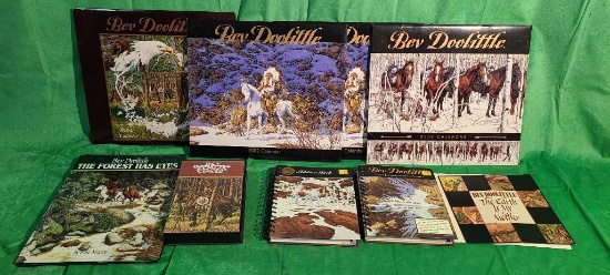 Lot of 9 Bev Doolittle Calendars, Books, Notes & Video Tape